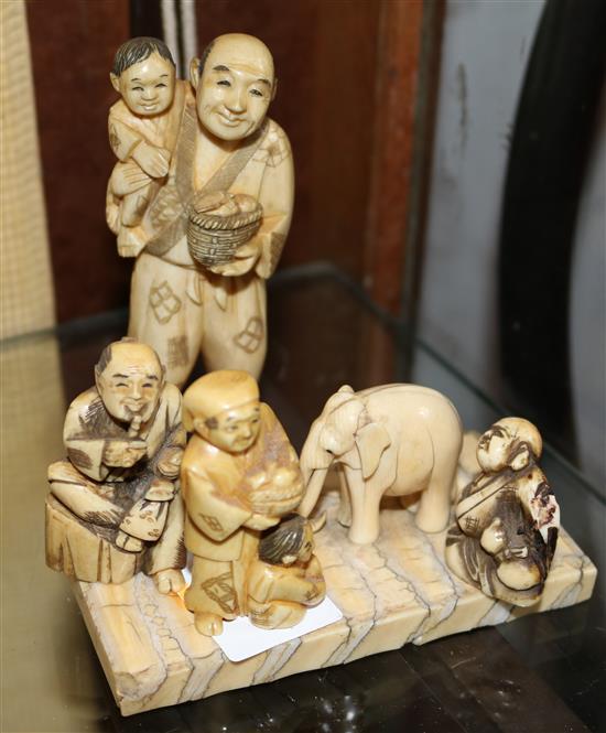 4 Japanese ivory figures. and elephant and a stand